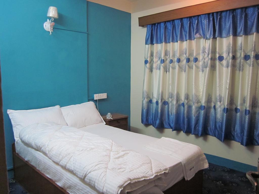 Hotel Api Catmandu Quarto foto