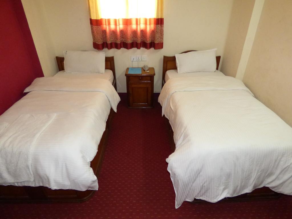 Hotel Api Catmandu Quarto foto