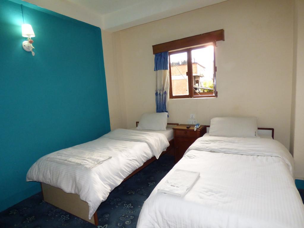 Hotel Api Catmandu Quarto foto